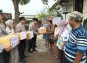 Senyum Renyah Warga Terima Bantuan Polres Madiun Kota di Hari Bhayangkara ke -79