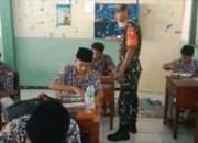 Babinsa Koramil Sidayu Dampingi Program Makan Siang Gratis di SMA Kanjeng Sepuh