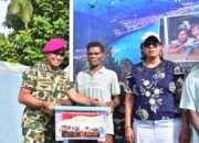 Semangat Delapan Dekade Pengabdian, Pasmar 3 Warnai HUT Korps Marinir dengan Bakti Sosial di Kampung Yeflio