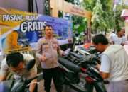 Pasang Alarm Gratis di Polsek Wonocolo Sepuluh Pendaftar Pertama Diberi Bonus Buah Durian